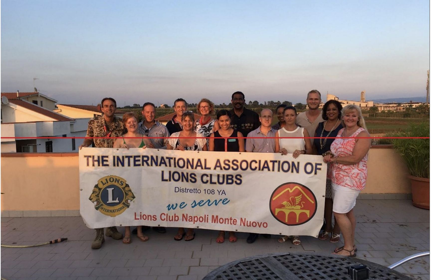 Photo of the NATO-associated branch of the Lions Club. “Maria Adela,” fourth from right