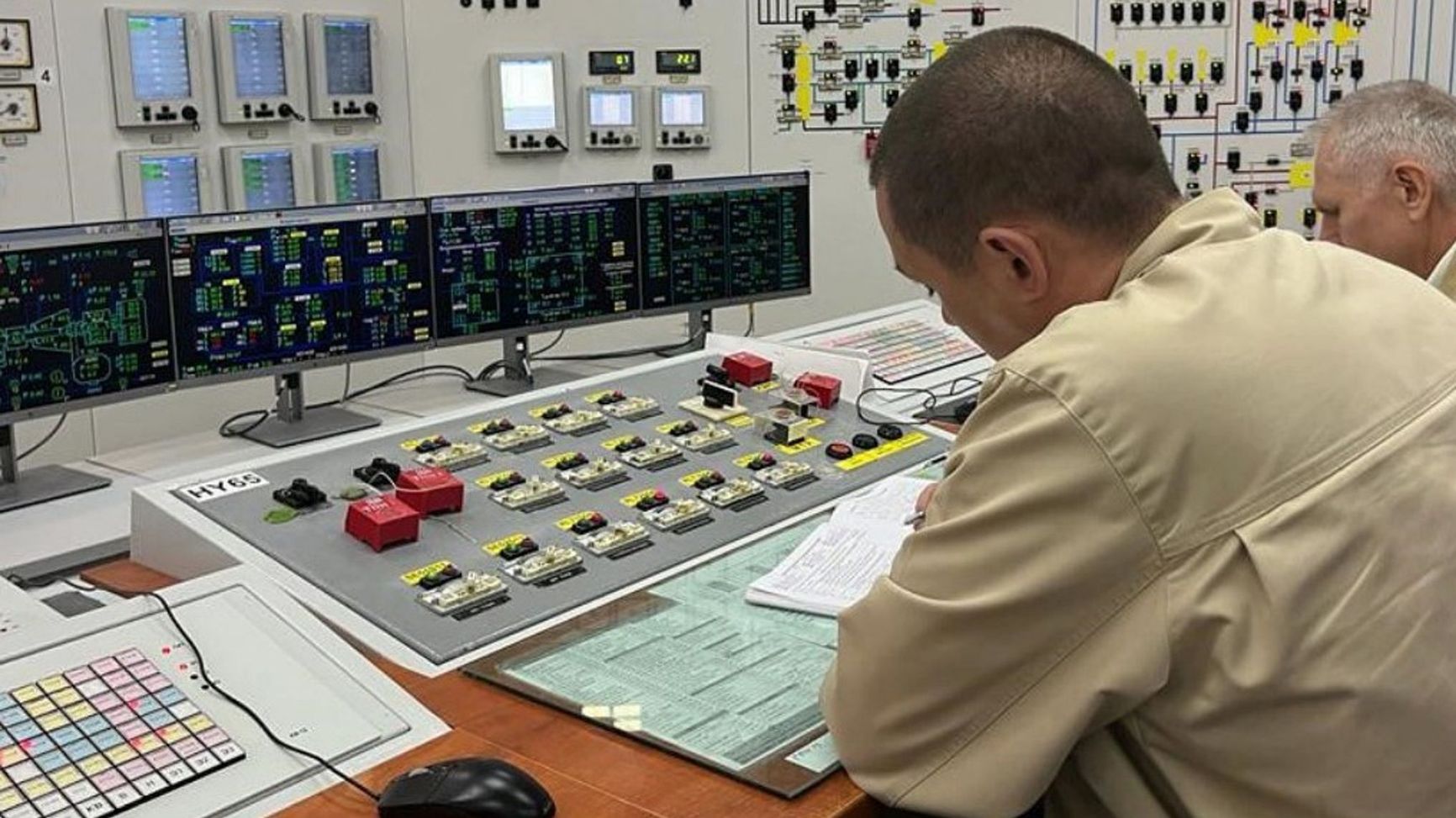 Employees of the Zaporizhzhia NPP at work in the engine room of Unit 5
